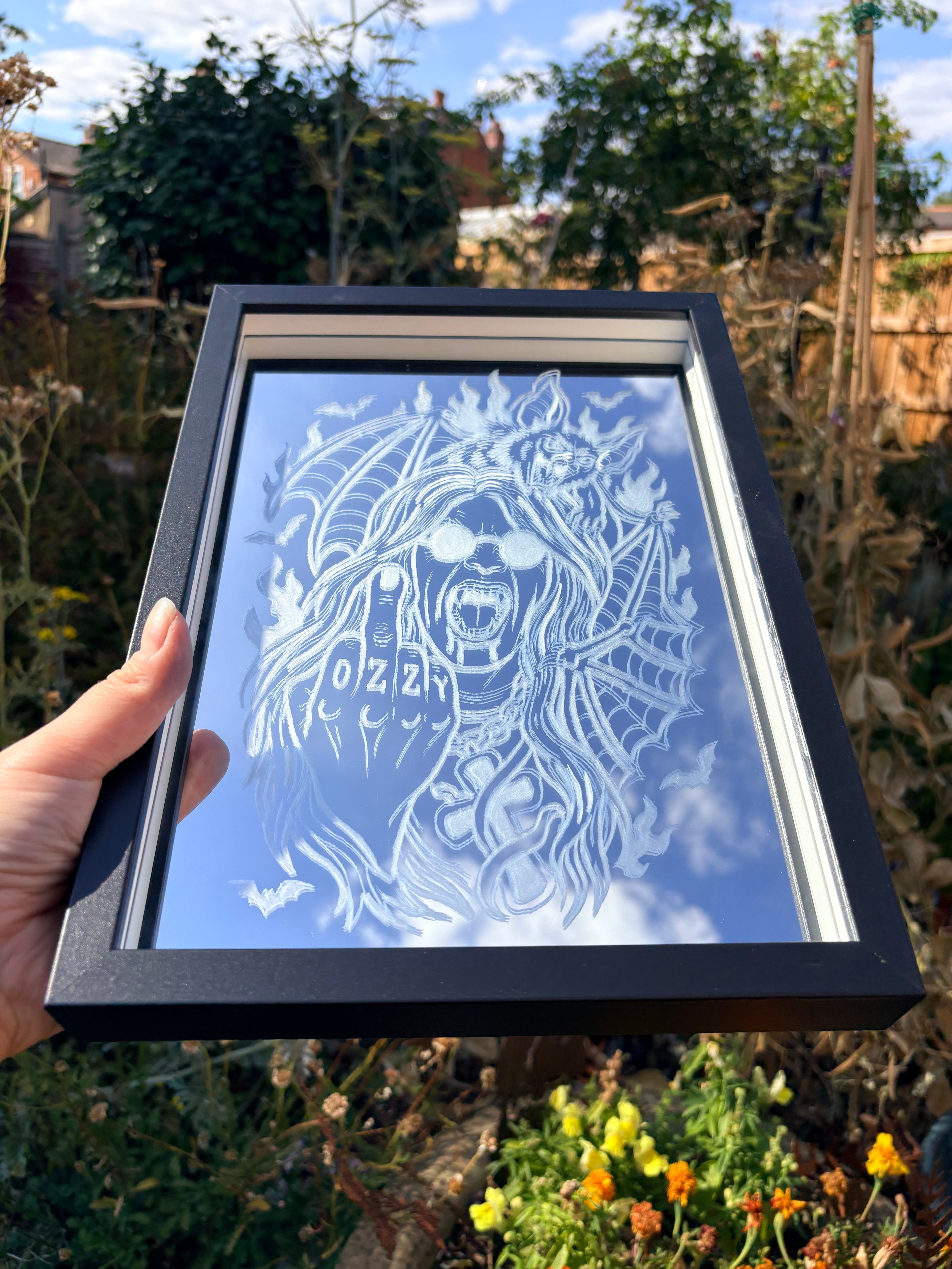 Ozzy Osbourne and bat inspired mirror