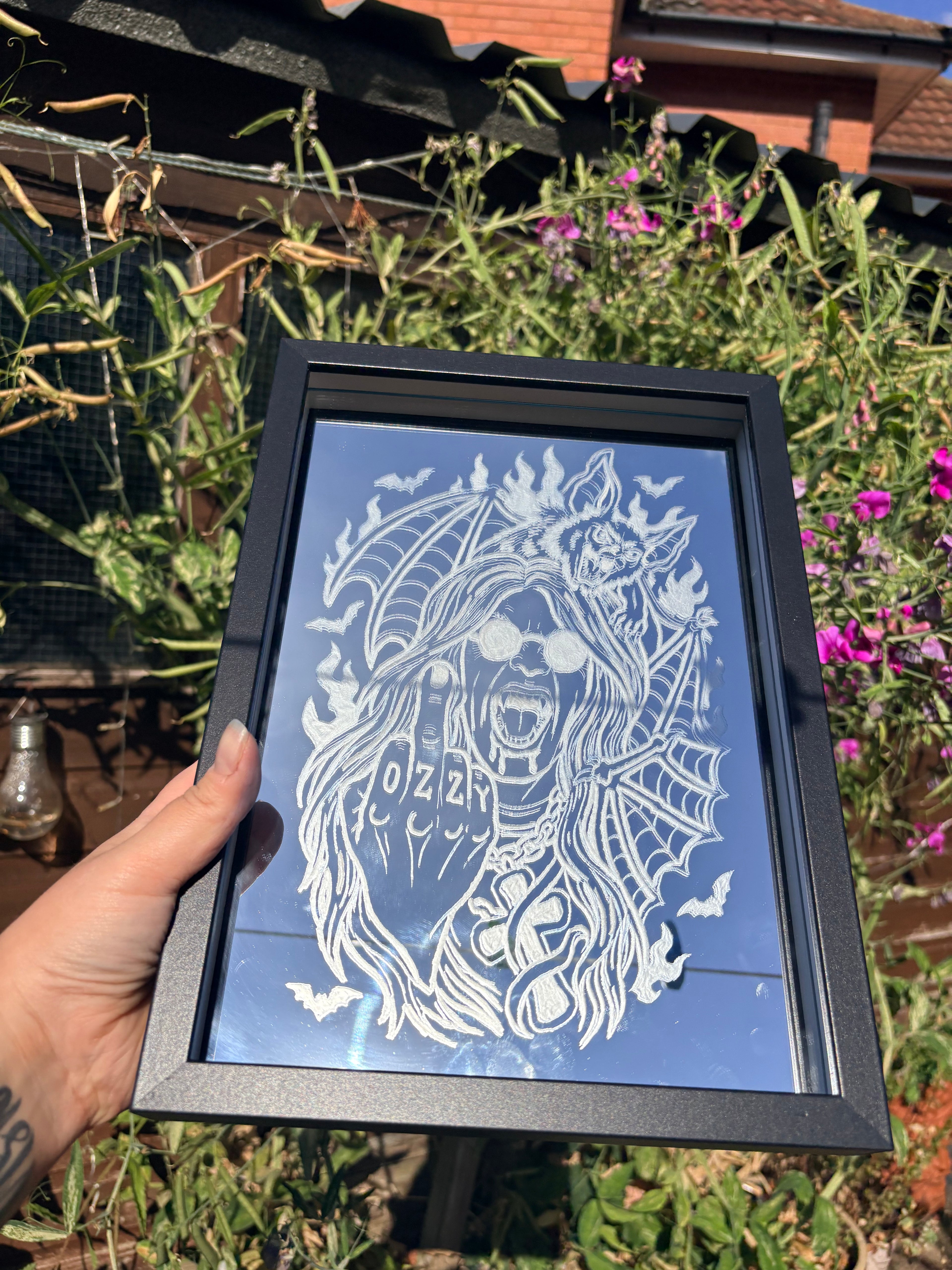 Ozzy Osbourne and bat inspired mirror