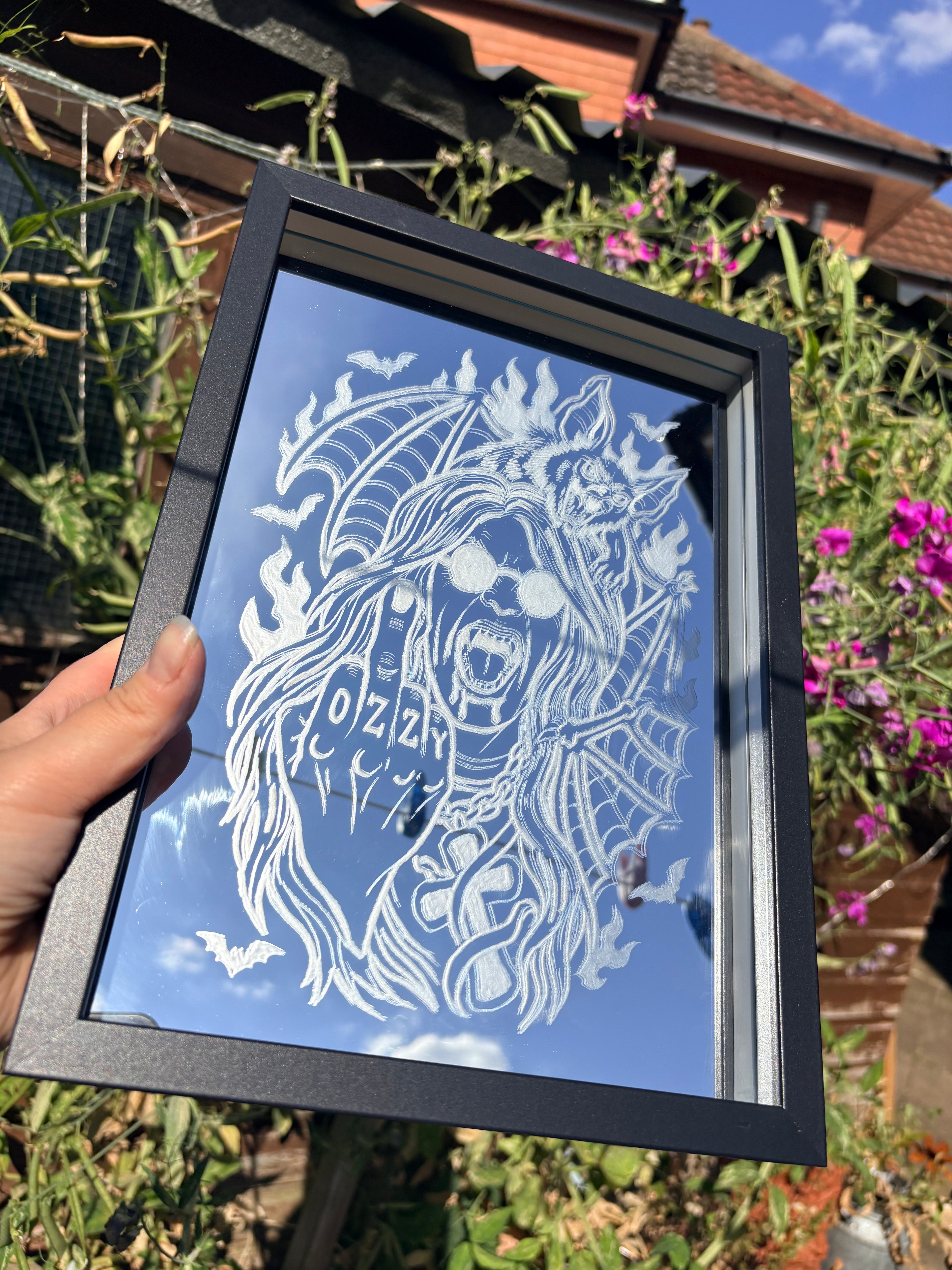Ozzy Osbourne and bat inspired mirror