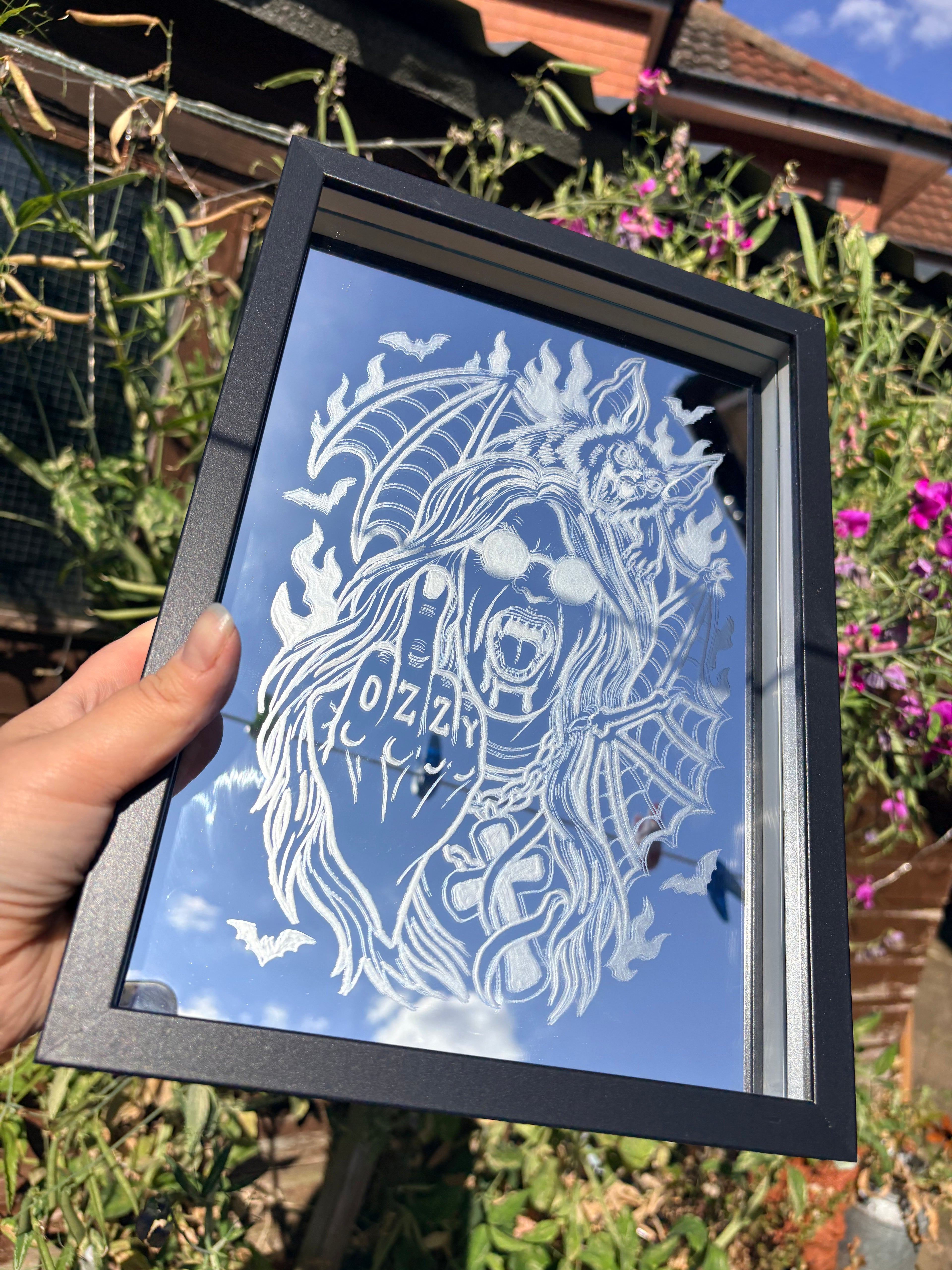 Ozzy Osbourne and bat inspired mirror